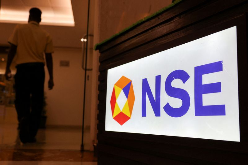 &copy; Reuters. FILE PHOTO: A man walks past the logo of the National Stock Exchange (NSE) in Mumbai, India, August 9, 2024. REUTERS/Francis Mascarenhas/File Photo