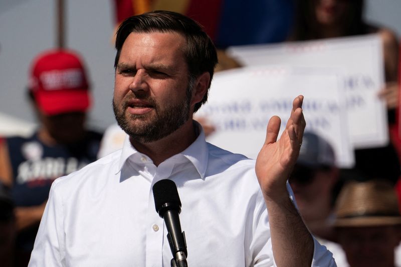 &copy; Reuters. FILE PHOTO: Republican U.S. vice presidential nominee Senator JD Vance speaks at Tucson Speedway in Tucson, Arizona, U.S. October 9, 2024. REUTERS/Go Nakamura/File Photo