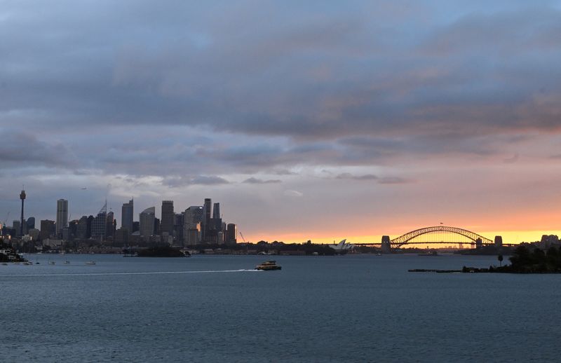 © Reuters. FILE PHOTO: A view over Sydney Harbour during sunset, in Sydney, Australia, July 3, 2024. REUTERS/Jaimi Joy/File Photo