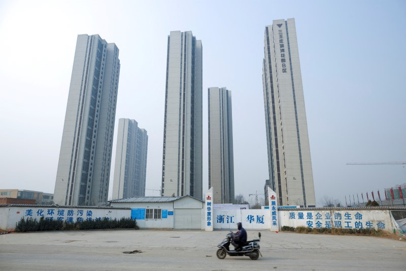 &copy; Reuters. Prédios em construção em Zhengzhou, Chinan19/01/2019. REUTERS/Thomas Peter/File Photo