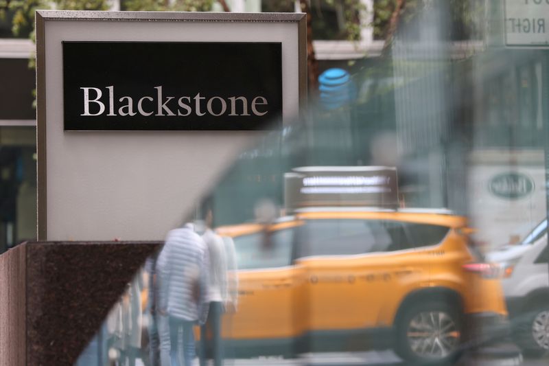 &copy; Reuters. Signage is seen outside The Blackstone Group headquarters in Manhattan, New York, U.S., November 12, 2021. REUTERS/Andrew Kelly/File Photo