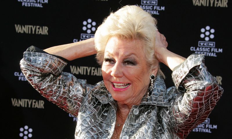 &copy; Reuters. FILE PHOTO: Actress Mitzi Gaynor, star of the 1958 film "South Pacific", poses as she arrives at the opening night gala of the TCM Classic Film Festival in Hollywood April 25, 2013. REUTERS/Fred Prouser/File Photo