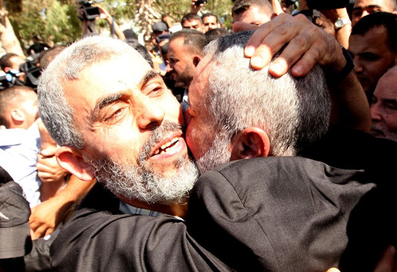 &copy; Reuters. FILE PHOTO: Freed Hamas top security strategist Yehya Al-Sinwar is hugged by senior Hamas leader Ismail Haniyeh (R) upon his arrival at the Rafah crossing with Egypt in the southern Gaza Strip October 18, 2011.REUTERS/Mohammed Salem/File Photo