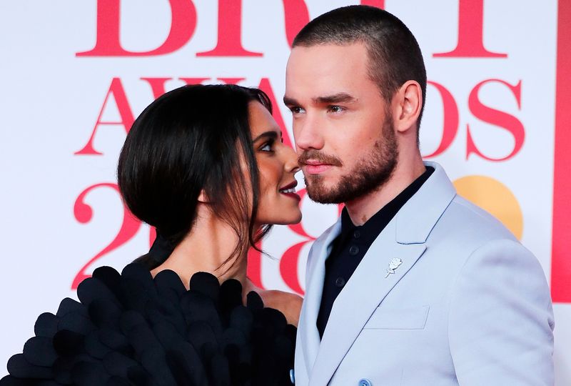 © Reuters. FILE PHOTO: Cheryl Tweedy and Liam Payne arrive at the Brit Awards at the O2 Arena in London, Britain, February 21, 2018. REUTERS/Eddie Keogh/File Photo