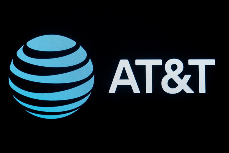 &copy; Reuters. The company logo for AT&T is displayed on a screen on the floor at the New York Stock Exchange (NYSE) in New York, U.S., September 18, 2019. REUTERS/Brendan McDermid/File Photo