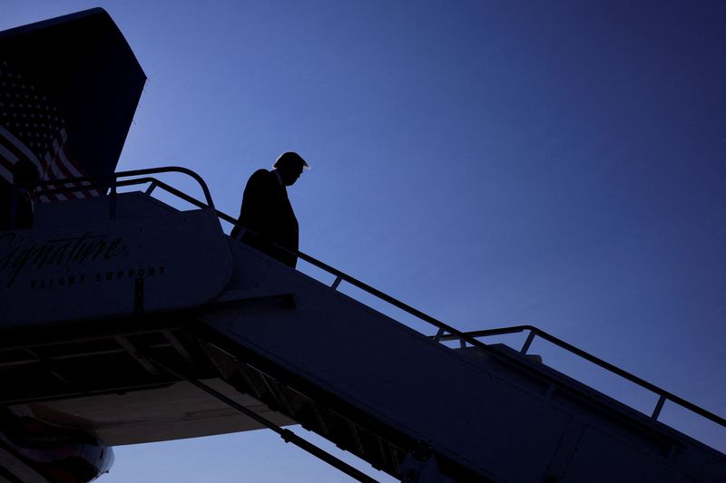 &copy; Reuters. Republican presidential nominee and former U.S. President Donald Trump disembarks "Trump Force One" at Detroit Metropolitan Wayne County Airport, in Detroit, Michigan, U.S. October 18, 2024. REUTERS/Brian Snyder