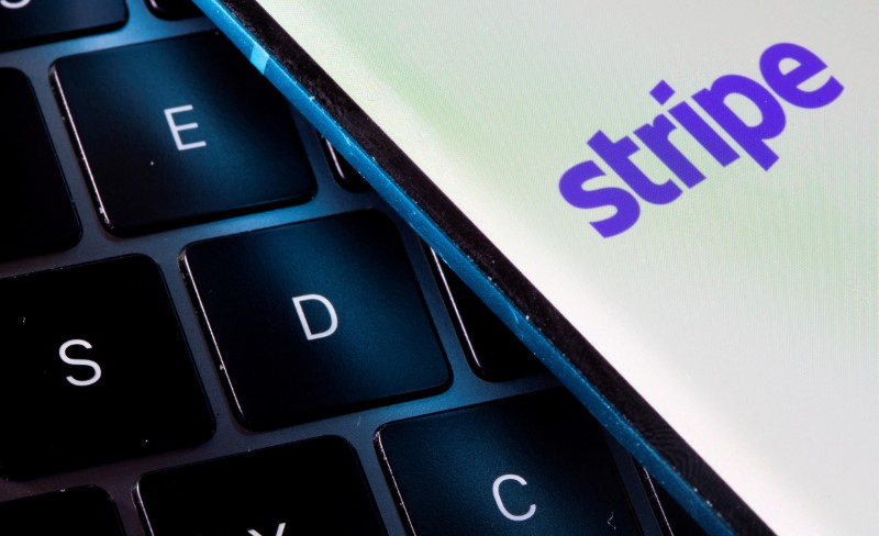 &copy; Reuters. FILE PHOTO: A smartphone with the Stripe logo is placed on a laptop in this illustration taken on July 14, 2021. REUTERS/Dado Ruvic/Illustration/File Photo