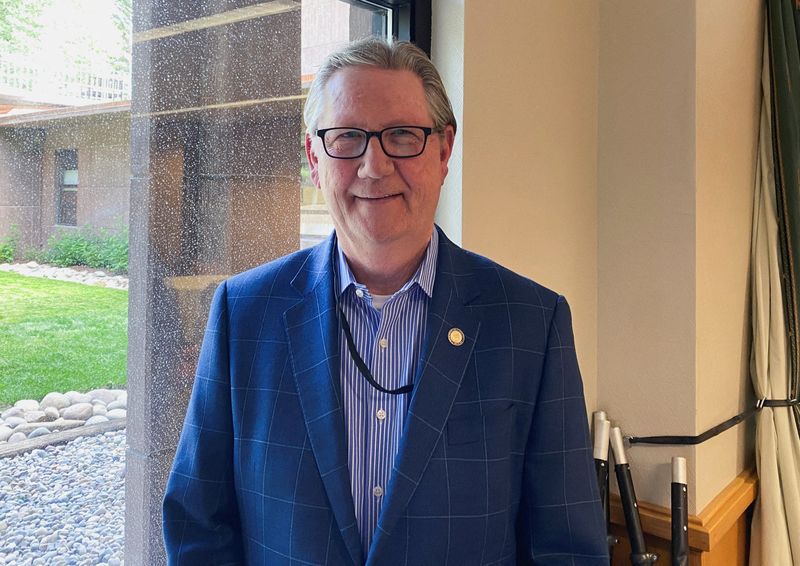 © Reuters. Federal Reserve Bank of Kansas City President Jeffrey Schmid poses at the Jackson Lake Lodge in Jackson Hole, Wyoming, U.S., where the Kansas City Fed holds its annual economic symposium, August 24, 2023. REUTERS/Ann Saphir/File Photo