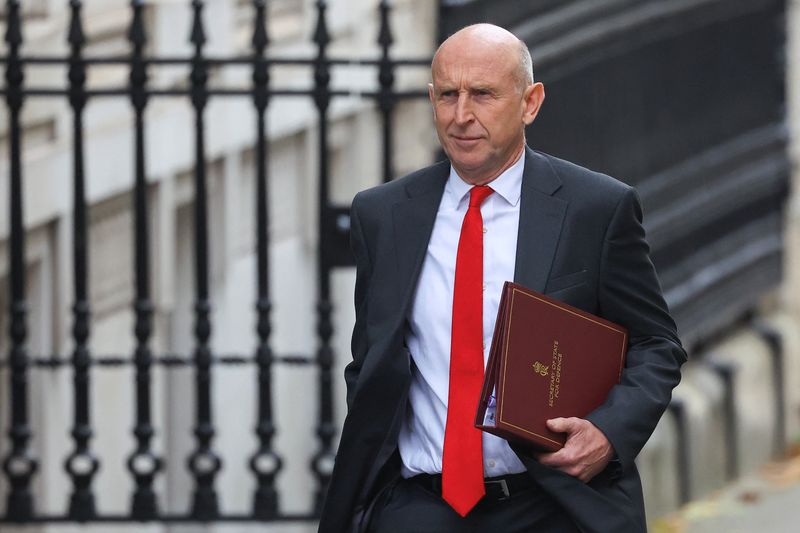 &copy; Reuters. FILE PHOTO: Britain's Defence Minister John Healey walks to 10 Downing Street, in London, Britain, September 9, 2024. REUTERS/Toby Melville/File Photo