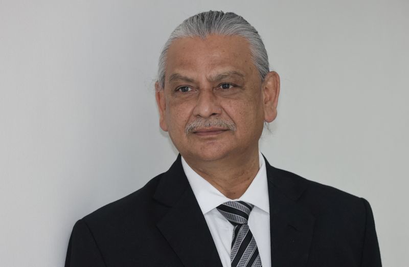 © Reuters. Reserve Bank of India (RBI) Deputy Governor Michael Patra, arrives at a news conference after a monetary policy review in Mumbai, India, August 5, 2022. REUTERS/Francis Mascarenhas/ File Photo