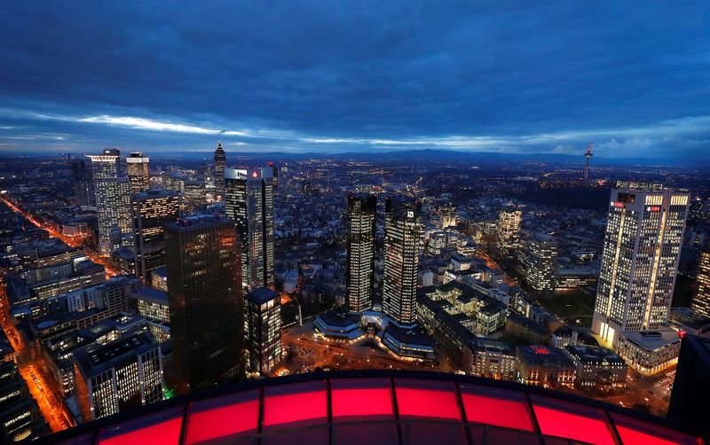 &copy; Reuters. FILE PHOTO: The financial district with the headquarters of Germany's largest business bank, Deutsche Bank (C), is photographed on early evening in Frankfurt, Germany, January 29, 2019.  REUTERS/Kai Pfaffenbach/File Photo