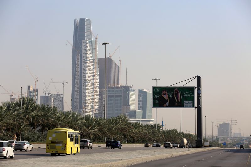 &copy; Reuters. FILE PHOTO: Cars drive past the King Abdullah Financial District in Riyadh, Saudi Arabia December 18, 2018. REUTERS/Faisal Al Nasser/File Photo