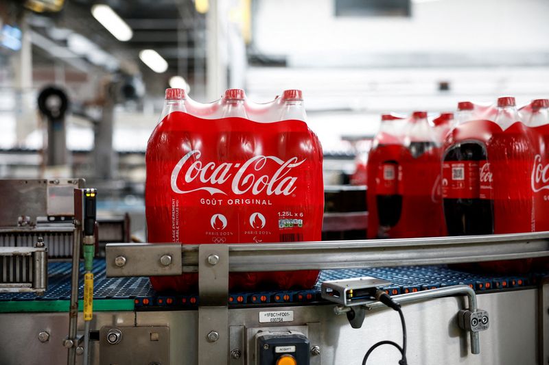 &copy; Reuters. FILE PHOTO: Polyethylene terephthalate (PET) bottles of Coca-Cola move along a conveyor belt on the production line at the Coca-Cola Europacific Partners bottling plant in Les Pennes-Mirabeau, near Marseille, France, May 7, 2024. REUTERS/Benoit Tessier/Fi