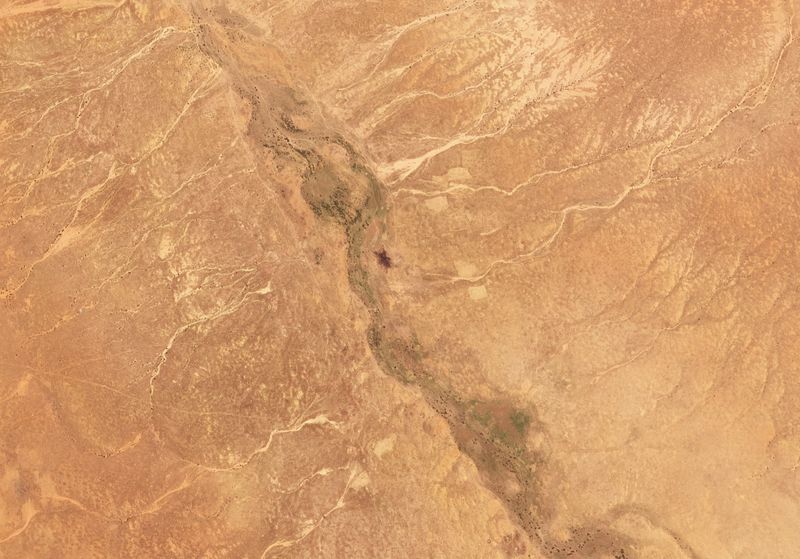 &copy; Reuters. A satellite image shows the area of a plane wreckage where the Rapid Support Forces (RSF) have shot down a Russian warplane, north of al-Fashir, Sudan, October 22, 2024. 2024 Planet Labs Inc/Handout via REUTERS