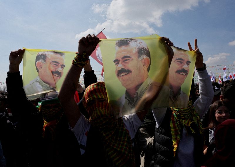 &copy; Reuters. FILE PHOTO: Supporters of pro-Kurdish Peoples' Equality and Democracy Party (DEM Party) display flags with a portrait of jailed Kurdistan Workers Party (PKK) leader Abdullah Ocalan, during a rally to celebrate Nowruz, which marks the arrival of spring, in