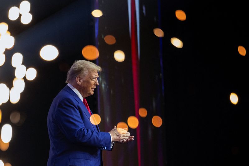 &copy; Reuters. Republican presidential nominee and former U.S. President Donald Trump attends a campaign event sponsored by conservative group Turning Point USA, in Duluth, Georgia, U.S., October 23, 2024. REUTERS/Carlos Barria