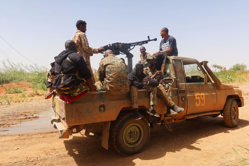 &copy; Reuters. FILE PHOTO: Members of Sudanese armed forces sit on an army vehicle in Omdurman, Sudan, March 9, 2024. REUTERS/El Tayeb Siddig/File Photo