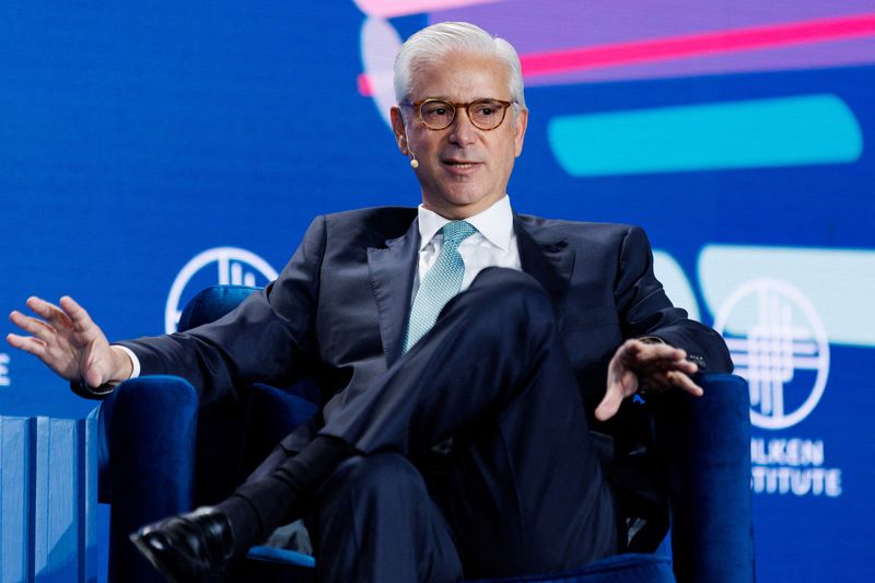 &copy; Reuters. FILE PHOTO: Charlie Scharf, CEO, Wells Fargo, speaks at the 2023 Milken Institute Global Conference in Beverly Hills, California, U.S., May 2, 2023. REUTERS/Mike Blake/File Photo