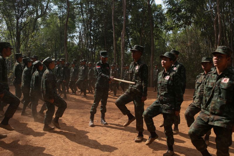 © Reuters. FILE PHOTO: New recruits of Bamar People's Liberation Army (BPLA) march during a training session at a camp in territory belonging to the Karen National Liberation Army (KNLA), in Karen State, Myanmar, March 6, 2024. REUTERS/Stringer/File Photo