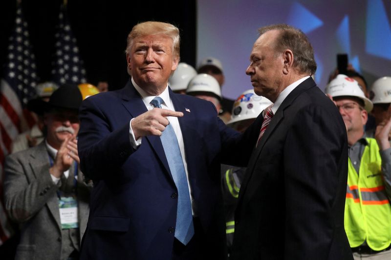 &copy; Reuters. FILE PHOTO: U.S. President Donald Trump greets Harold Hamm after he was introduced by Hamm at the Shale Insight 2019 Conference in Pittsburgh, Pennsylvania, U.S., October 23, 2019. REUTERS/Leah Millis/File Photo