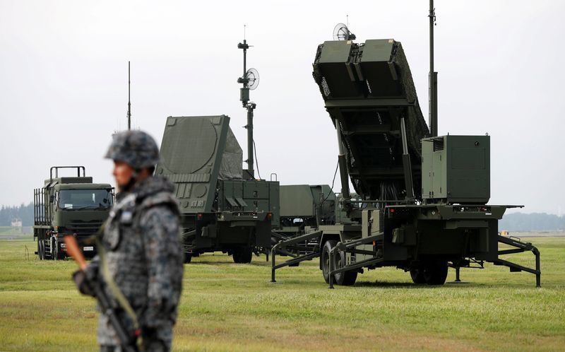 © Reuters. FILE PHOTO: A Japan Self-Defense Forces (JSDF) soldier takes part in a drill to mobilise their Patriot Advanced Capability-3 (PAC-3) missile unit in response to a recent missile launch by North Korea, at U.S. Air Force Yokota Air Base in Fussa on the outskirts of Tokyo, Japan August 29, 2017.   REUTERS/Issei Kato/File photo