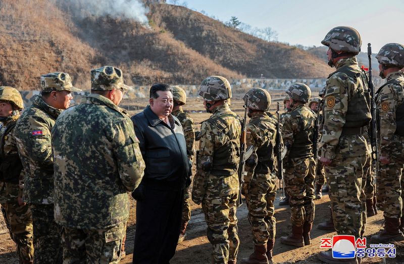 &copy; Reuters. FILE PHOTO: North Korean leader Kim Jong Un inspects field training of troops at a major military operations base in the western region of the country, as he ordered heightened readiness for war, KCNA news agency reported, in North Korea, in this picture 