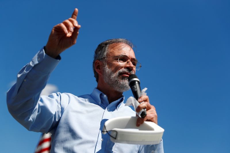 &copy; Reuters. FILE PHOTO: Members of ReOpen Maryland listen to Rep. Andy Harris (R-MD) speak during a road rally procession calling for the re-opening for the state of Maryland amid the coronavirus disease (COVID-19) outbreak, in Sailsbury, Maryland, U.S., May 2, 2020.