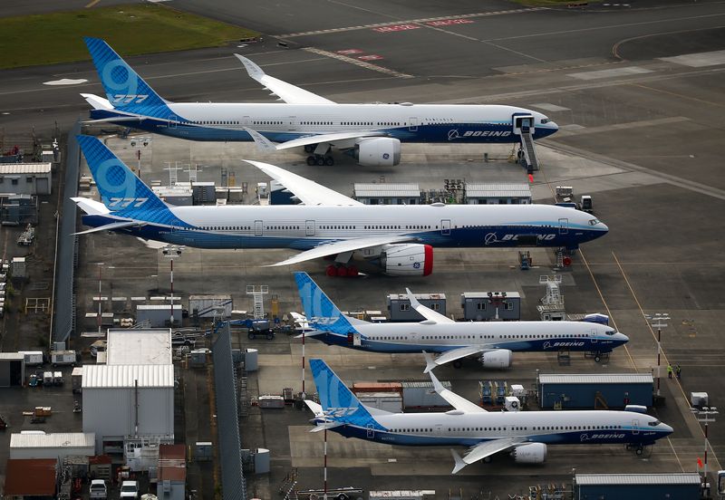 © Reuters. FILE PHOTO: An aerial view of Boeing 777X and Boeing 737 MAX 10 airplanes parked at King County International Airport-Boeing Field, in Seattle, Washington, U.S, June 1, 2022.  REUTERS/Lindsey Wasson/File Photo