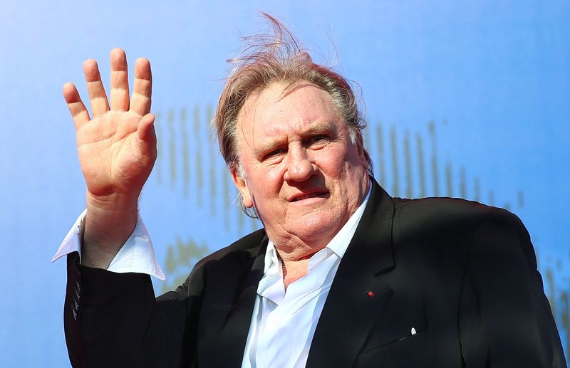 &copy; Reuters. FILE PHOTO: Gerard Depardieu waves as he arrives during a red carpet event for the movie "Novecento- Atto Primo" at the 74th Venice Film Festival in Venice, Italy, Italy September 5, 2017. REUTERS/Alessandro Bianchi/File Photo