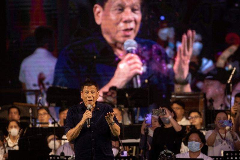 &copy; Reuters. Philippine President Rodrigo Duterte sings to his supporters during a thanksgiving concert held before he ended his six-year term, in Quirino Grandstand, Manila, Philippines, June 26, 2022. REUTERS/Eloisa Lopez/File Photo