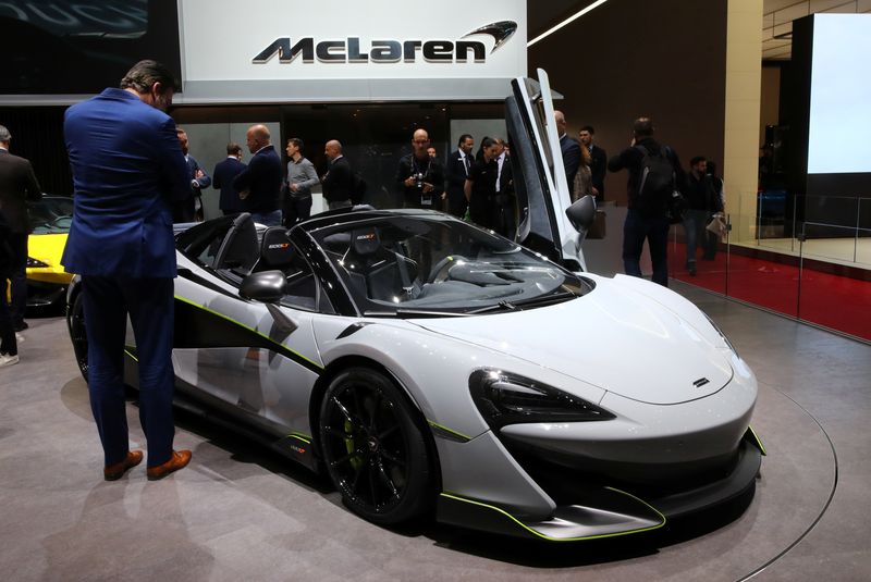 &copy; Reuters. FILE PHOTO: Visitors look at the 600LT model car ont he McLaren stand at the 89th Geneva International Motor Show in Geneva, Switzerland March 6, 2019. REUTERS/Denis Balibouse/File Photo