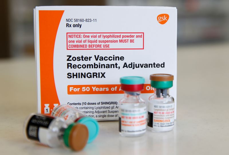 © Reuters. A box and vials of the drug Shingrix, made by GlaxoSmithKline Pharmaceutical, sit on a counter at a pharmacy in Provo, Utah, U.S. January 9, 2020.   REUTERS/George Frey/File Photo