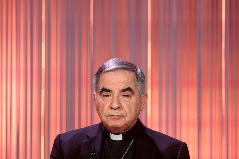 © Reuters. Cardinal Angelo Becciu, who was convicted of embezzlement and fraud and sentenced to five-and-a-half years in jail, looks on during the taping of the television talk show 