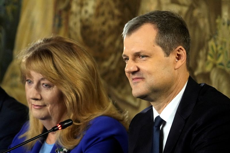 © Reuters. FILE PHOTO: Social Democrats leader Vilija Blinkeviciute and deputy leader Gintautas Paluckas attend a press conference after the party's general election victory, in Vilnius, Lithuania October 28, 2024. REUTERS/Ints Kalnins/File Photo