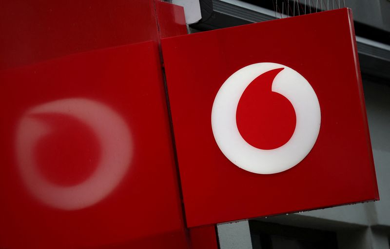 &copy; Reuters. A view of a signage outside a Vodafone mobile phone store in Liverpool, Britain, October 8, 2024. REUTERS/Phil Noble/ FIle Photo