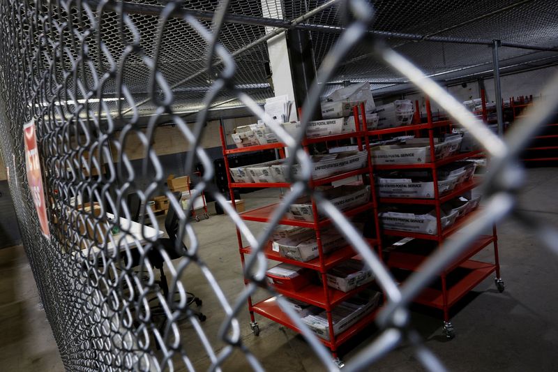 &copy; Reuters. FILE PHOTO: Voting ballots sit in bins in a locked area inside the Allegheny County Elections Warehouse in Pittsburgh, Pennsylvania, U.S., October 30, 2024. REUTERS/Shannon Stapleton/File Photo