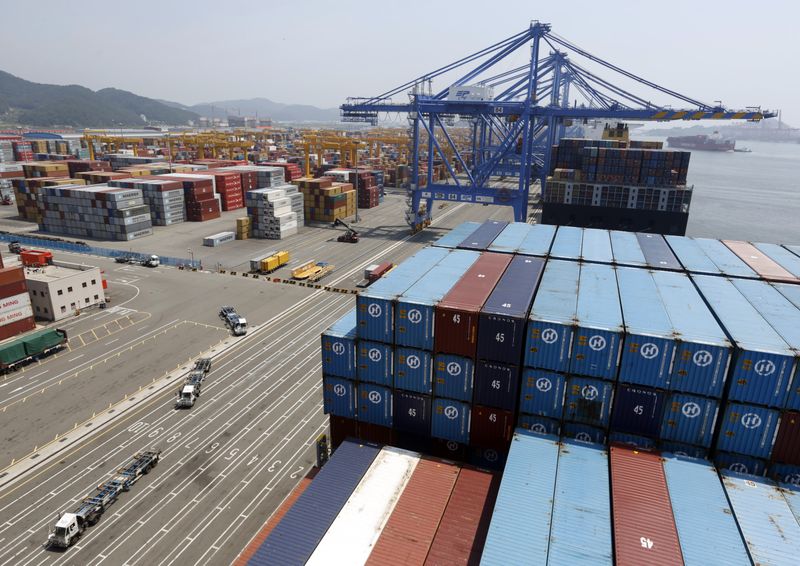 © Reuters. FILE PHOTO: Trucks used to transport containers are seen at the Hanjin Shipping container terminal at the Busan New Port in Busan, about 420 km (261 miles) southeast of Seoul, August 8, 2013. Picture taken August 8, 2013. REUTERS/Lee Jae-Won/File Photo