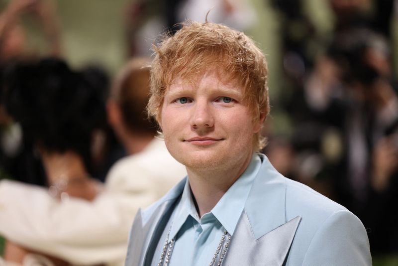 © Reuters. FILE PHOTO: Ed Sheeran poses at the Met Gala, an annual fundraising gala held for the benefit of the Metropolitan Museum of Art's Costume Institute with this year's theme 'Sleeping Beauties: Reawakening Fashion' in New York City, New York, U.S., May 6, 2024. REUTERS/Andrew Kelly/File Photo