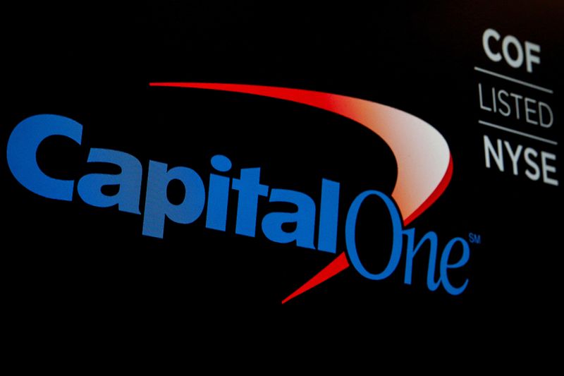 © Reuters. The logo and ticker for Capital One are displayed on a screen on the floor of the New York Stock Exchange (NYSE) in New York, U.S., May 21, 2018. REUTERS/Brendan McDermid/File Photo