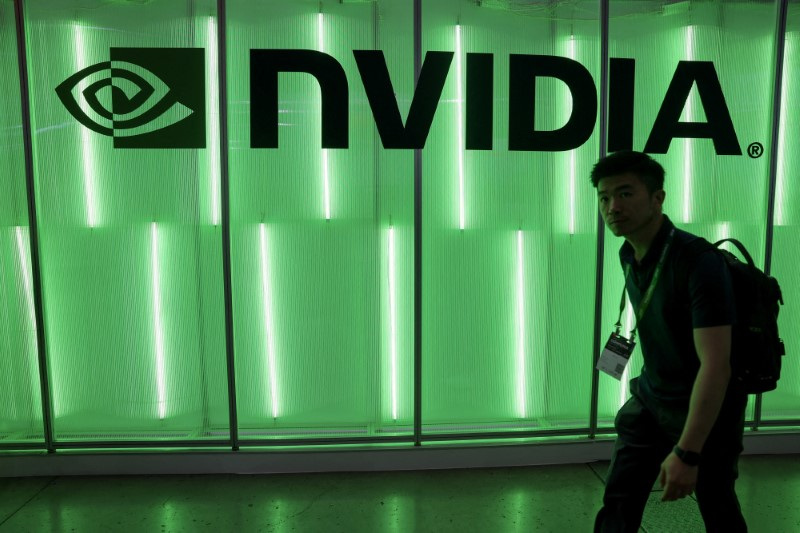 © Reuters. A person walks pass a Nvidia logo at Computex in Taipei, Taiwan June 5, 2024. REUTERS/Ann Wang/File Photo