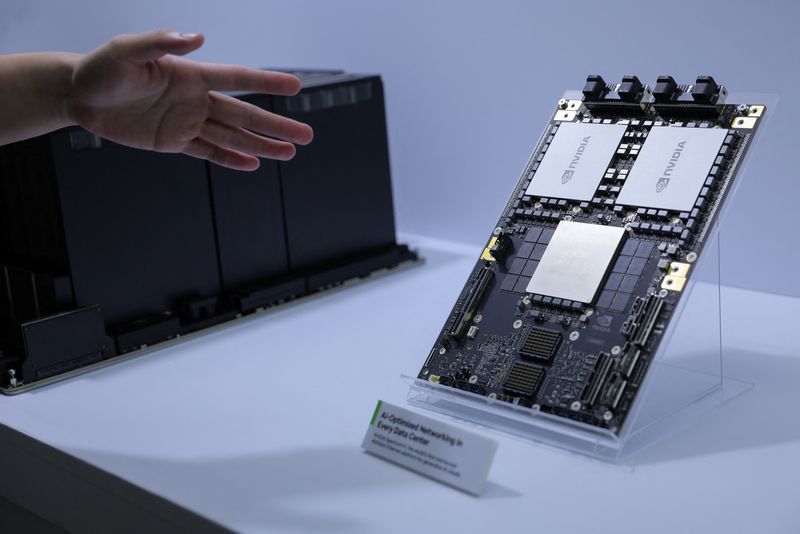 &copy; Reuters. A person gestures next to an Nvidia Spectrum-X at COMPUTEX in Taipei, Taiwan June 4, 2024. REUTERS/Ann Wang/File Photo