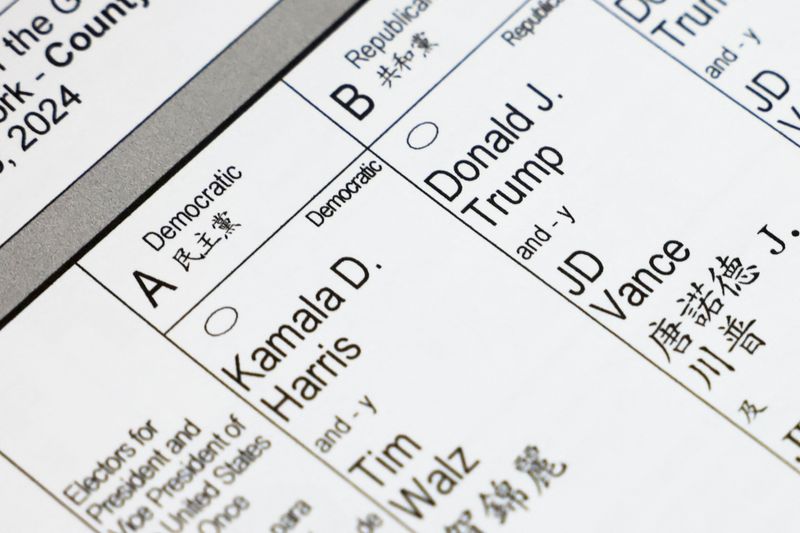 © Reuters. The names of Democratic presidential nominee and U.S. Vice President Kamala Harris, Democratic Vice-Presidential nominee Tim Walz, Republican presidential nominee and former U.S. President Donald Trump and Republican vice presidential nominee JD Vance are shown on an official ballot for the 2024 U.S. presidential election, on Election Day in Manhattan, New York City, U.S., November 5, 2024. REUTERS/Andrew Kelly