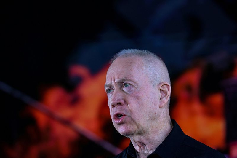 &copy; Reuters. FILE PHOTO: Israel's Defence Minister Yoav Gallant speaks during a memorial ceremony of the Hamas attack on October 7 last year that sparked the ongoing war in Gaza, at the Mount Herzl military cemetery in Jerusalem on October 27, 2024. GIL COHEN-MAGEN/Po