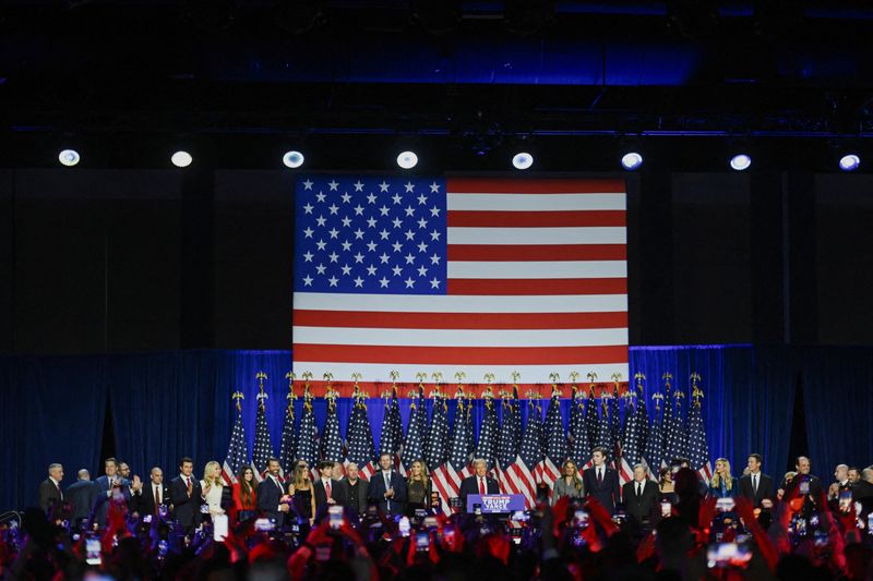 © Reuters. Republican presidential nominee and former U.S. President Donald Trump takes the stage following early results from the 2024 U.S. presidential election in Palm Beach County Convention Center, in West Palm Beach, Florida, U.S., November 6, 2024. REUTERS/Callaghan O'Hare     TPX IMAGES OF THE DAY