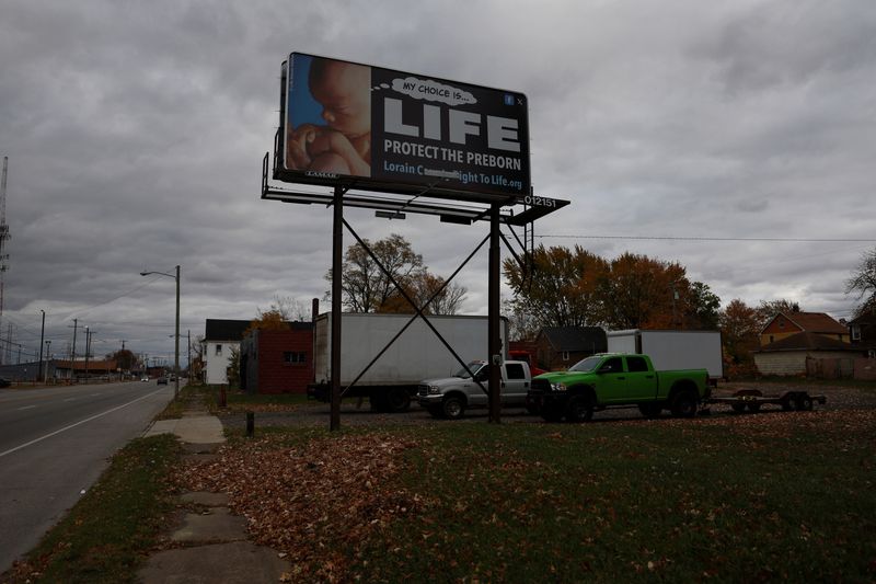 &copy; Reuters. FILE PHOTO: An anti-abortion advertisement stands posted in Lorain, Ohio, U.S., November 1, 2024. REUTERS/Shannon Stapleton/File Photo