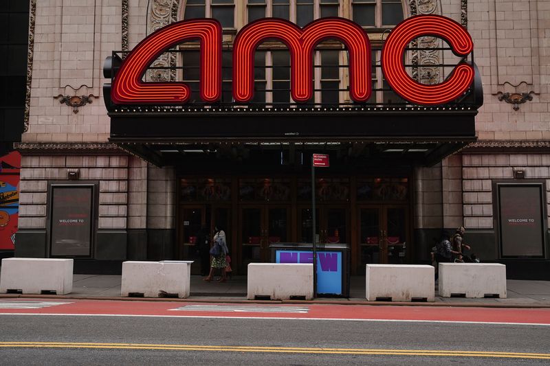 &copy; Reuters. FILE PHOTO: An AMC theatre is pictured in Times Square in the Manhattan borough of New York City, New York, U.S., June 2, 2021.  REUTERS/Carlo Allegri/File Photo