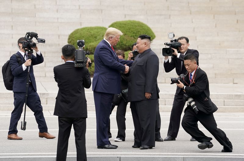 &copy; Reuters. FILE PHOTO: U.S. President Donald Trump meets with North Korean leader Kim Jong Un at the demilitarized zone separating the two Koreas, in Panmunjom, South Korea, June 30, 2019. REUTERS/Kevin Lamarque/File Photo