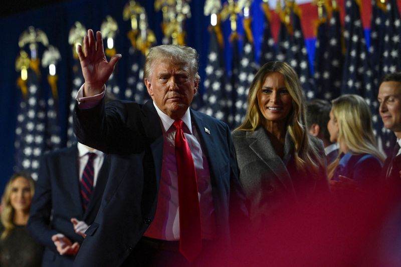 © Reuters. Republican presidential nominee and former U.S. President Donald Trump waves while walking off stage following early results from the 2024 U.S. presidential election in Palm Beach County Convention Center, in West Palm Beach, Florida, U.S., November 6, 2024. REUTERS/Callaghan O'Hare/File Photo