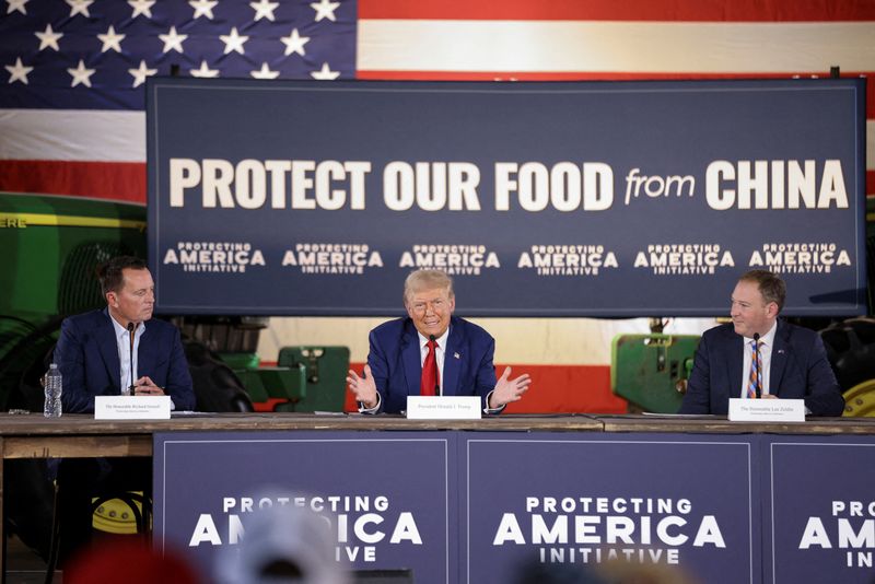 © Reuters. FILE PHOTO: Republican presidential nominee and former U.S. President Donald Trump speaks while taking part in a round table with local farmers and officials, during an agricultural policy event in Smithton, Pennsylvania, U.S. September 23, 2024. REUTERS/Quinn Glabicki/File Photo