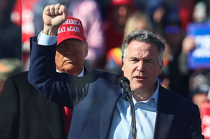 &copy; Reuters. FILE PHOTO: David McCormick, a Republican candidate for U.S. Senate in Pennsylvania gestures, as Republican presidential nominee and former U.S. President Donald Trump holds a campaign rally, in Lititz, Pennsylvania, U.S. November 3, 2024. REUTERS/Eloisa 